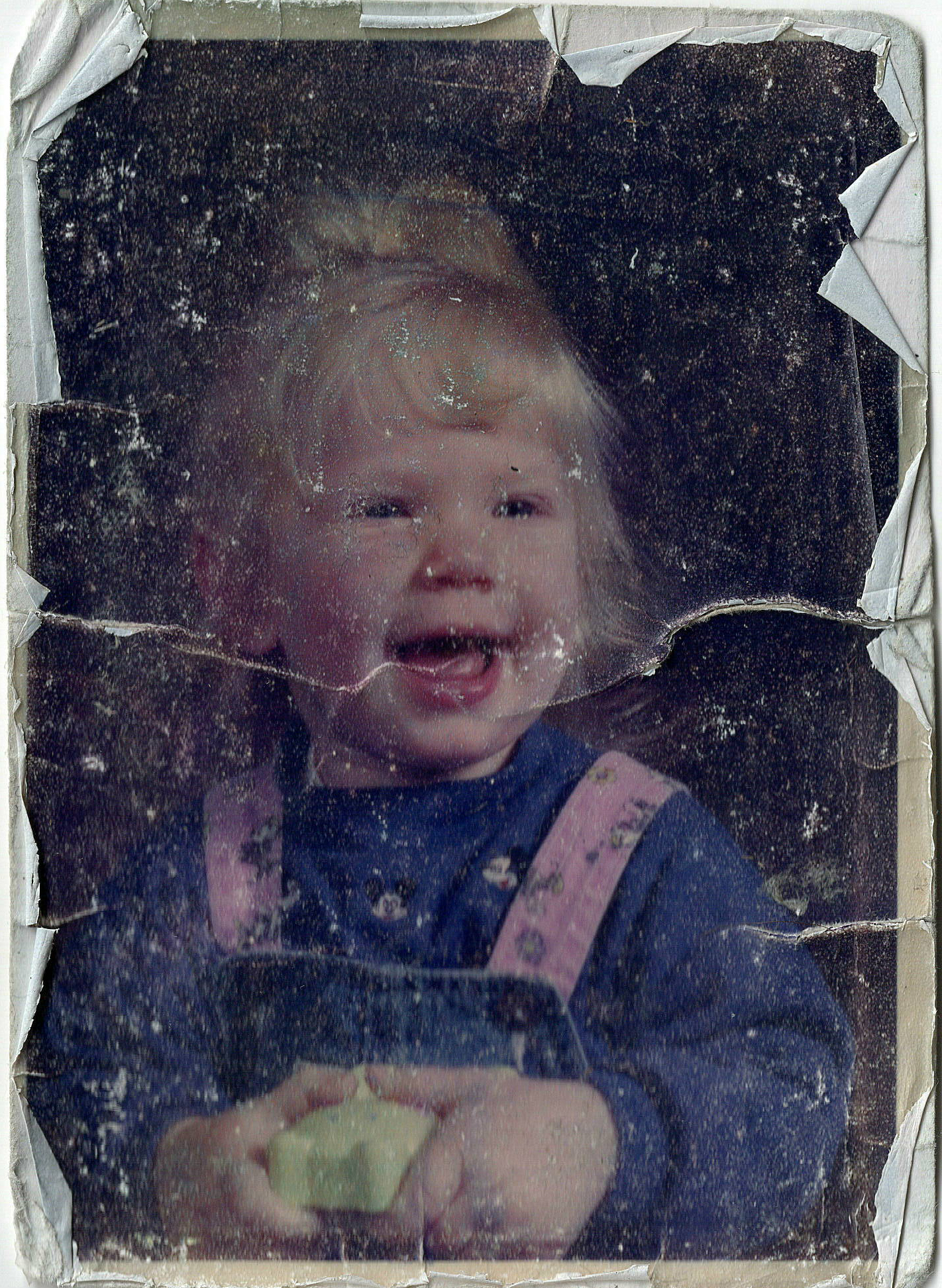 Damaged photograph before restoration